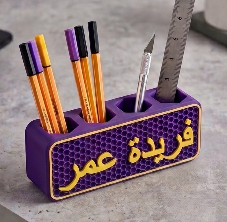 حامل أقلام على شكل خلية نحل