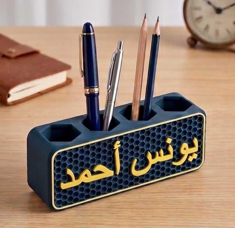 حامل أقلام على شكل خلية نحل