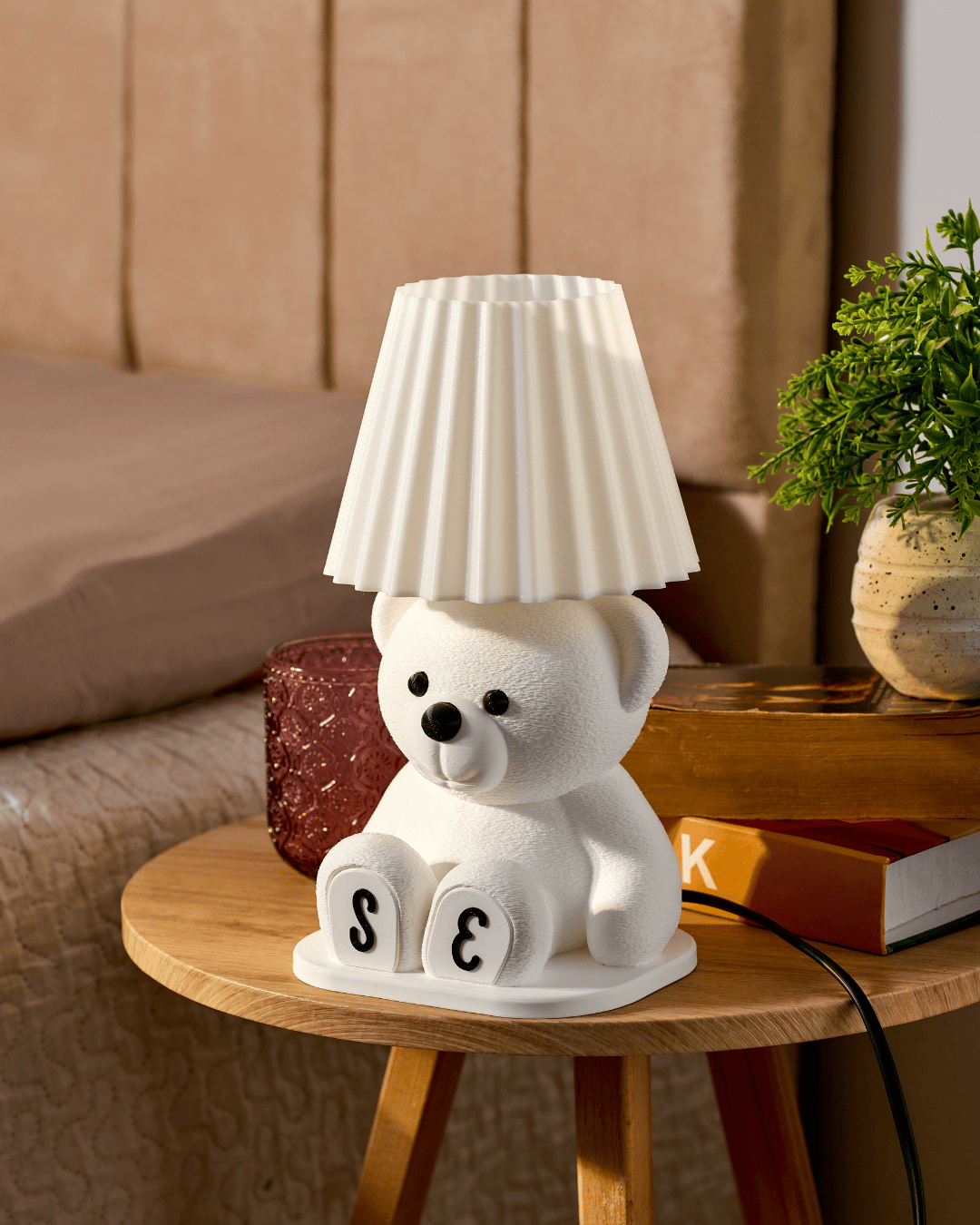 White 3D printed personalized teddy bear lamp with custom initials on the paws.