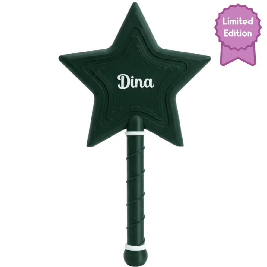 Green star-shaped credit card wand with 'Dina' on it, labeled as limited edition.