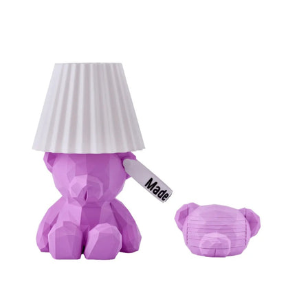 Purple bear-shaped lamp and a matching coasters with white pleated shade on a white background
